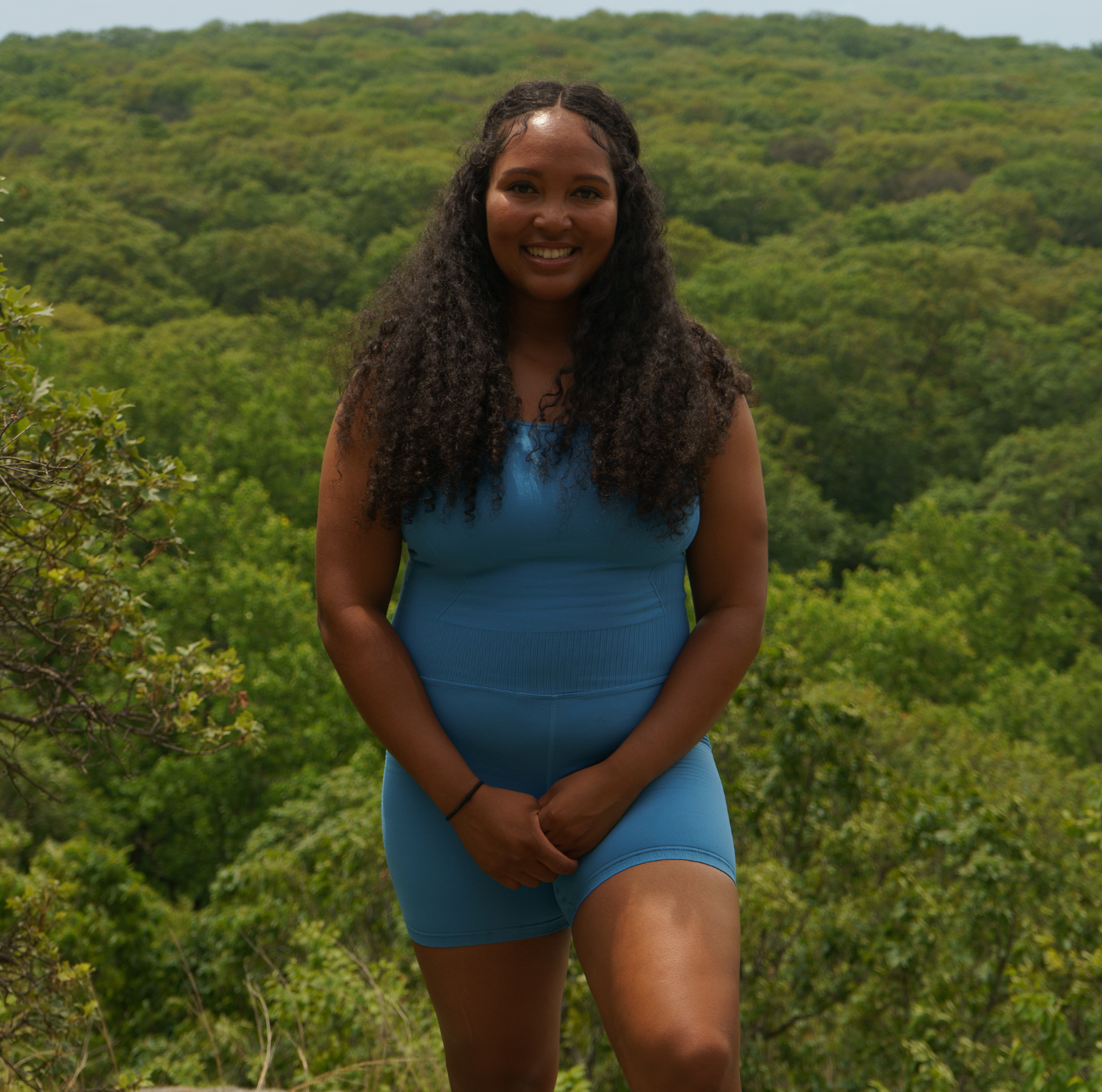 woman in blue outfit hiking