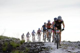 Yolande Speedy leads a pack through a burnt section of the sixth stage in 2009.