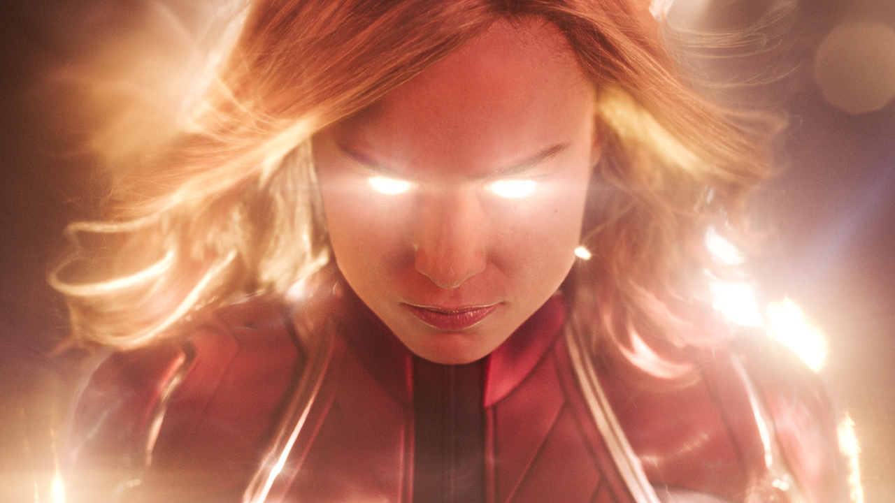 Captain Marvel with glowing eyes and body.