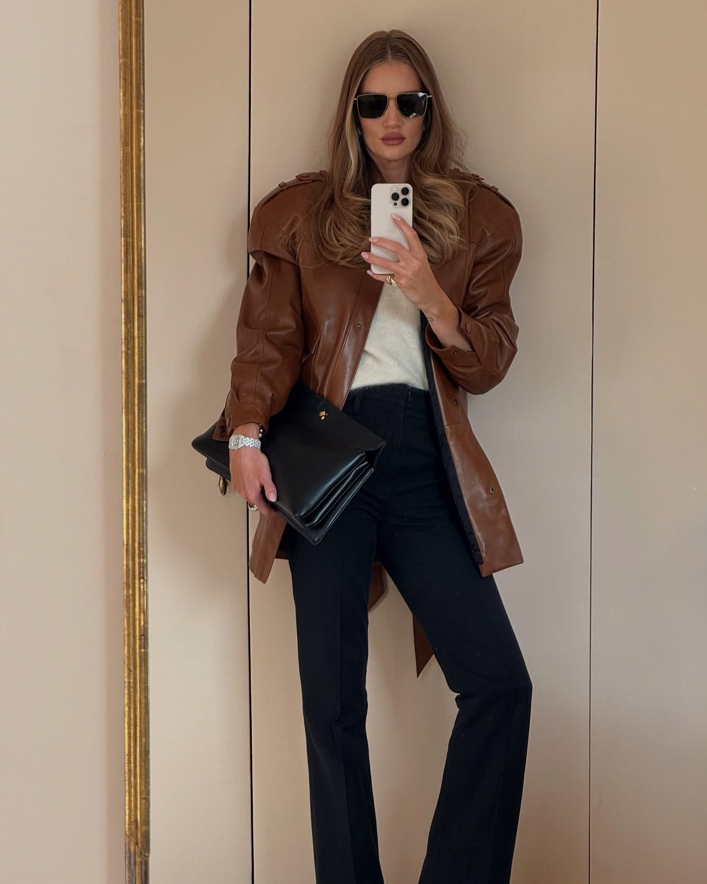An image of @rosiehw wearing the Cartier Panthère watch.
