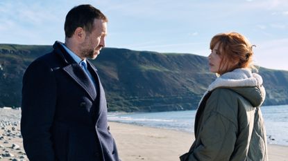Rafe Spall as Eric Bull & Kelly Reilly as Jackie Ellis in Under Salt Marsh
