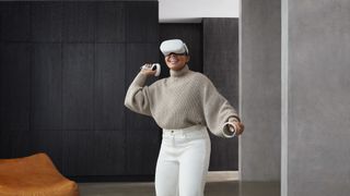 How to Keep VR Headsets Clean: image shows woman playing withy Oculus Quest 2 VR headset