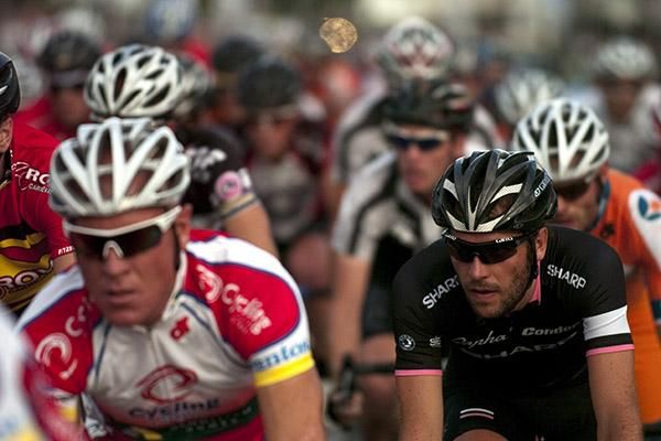 Dean Windsor (right) of the Rapha Condor team in the thick of it during the mens' elite criterium