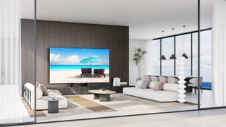TCL's C83K mini LED TV in a bright, white living room