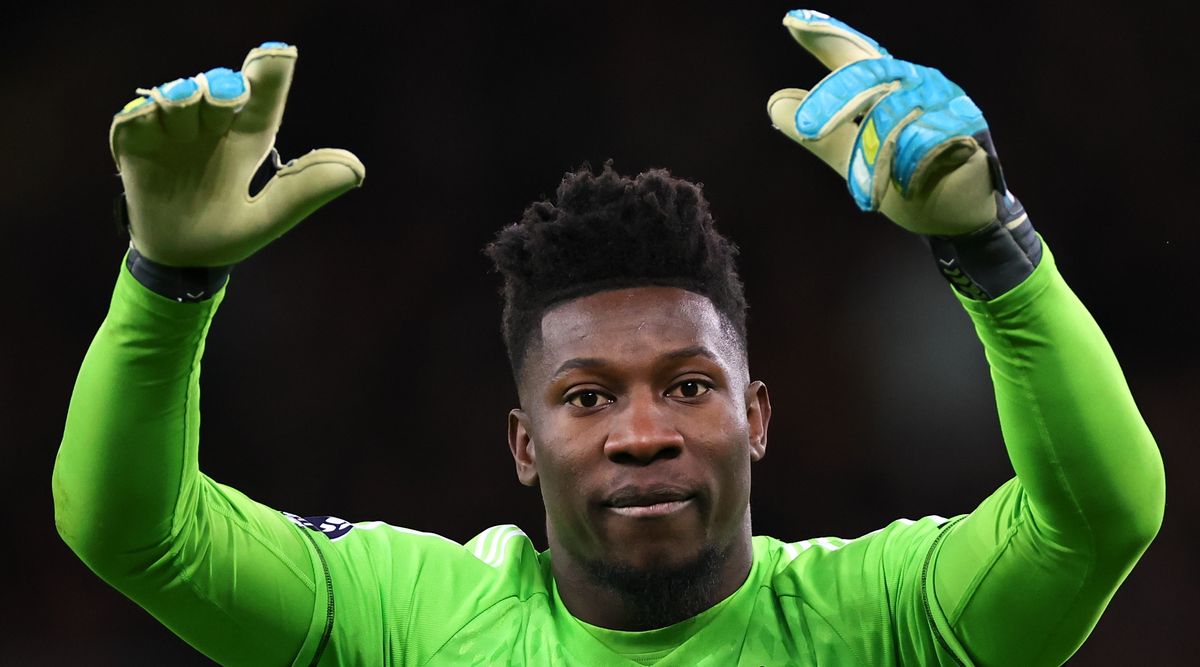 Andre Onana of Manchester United during the Premier League match between Manchester United and Tottenham Hotspur at Old Trafford on January 14, 2024 in Manchester, England. (Photo by Robbie Jay Barratt - AMA/Getty Images)