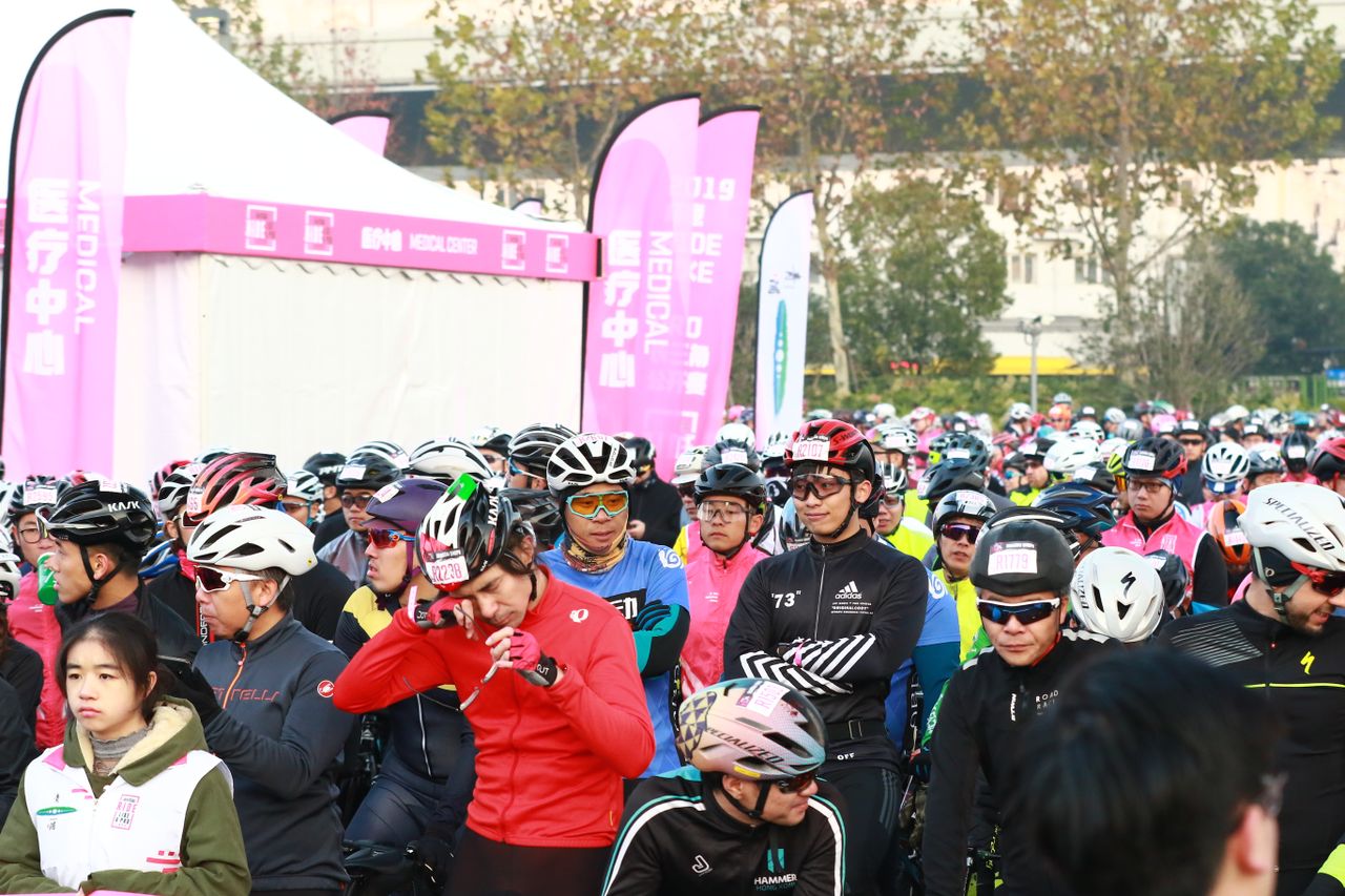 Riders wait patiently for the start of the race