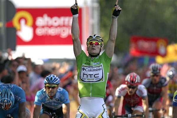 Andr&eacute; Greipel (Columbia-HTC) raises his arms in celebration.