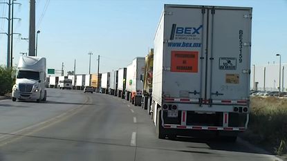 Trucks waiting to cross into the U.S. from Mexico