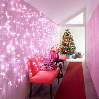 pink wall with lights pink seat christmas tree