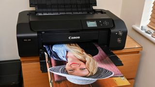 Canon imagePROGRAF PRO-300 Wireless Inkjet Printer being tested in writer's home