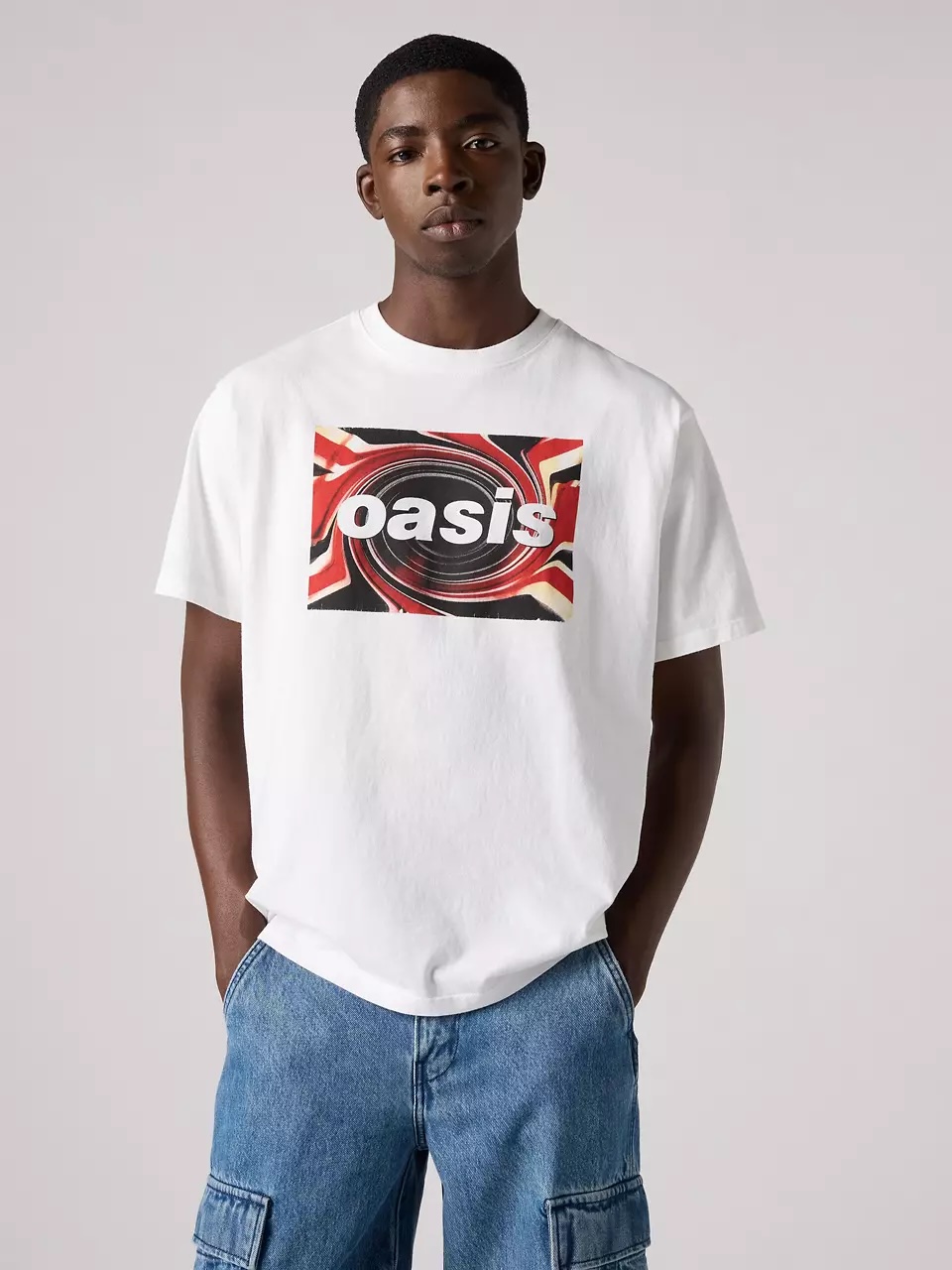 Oasis Levi's collection: white t-shirt with Oasis on the chest with a pattern background