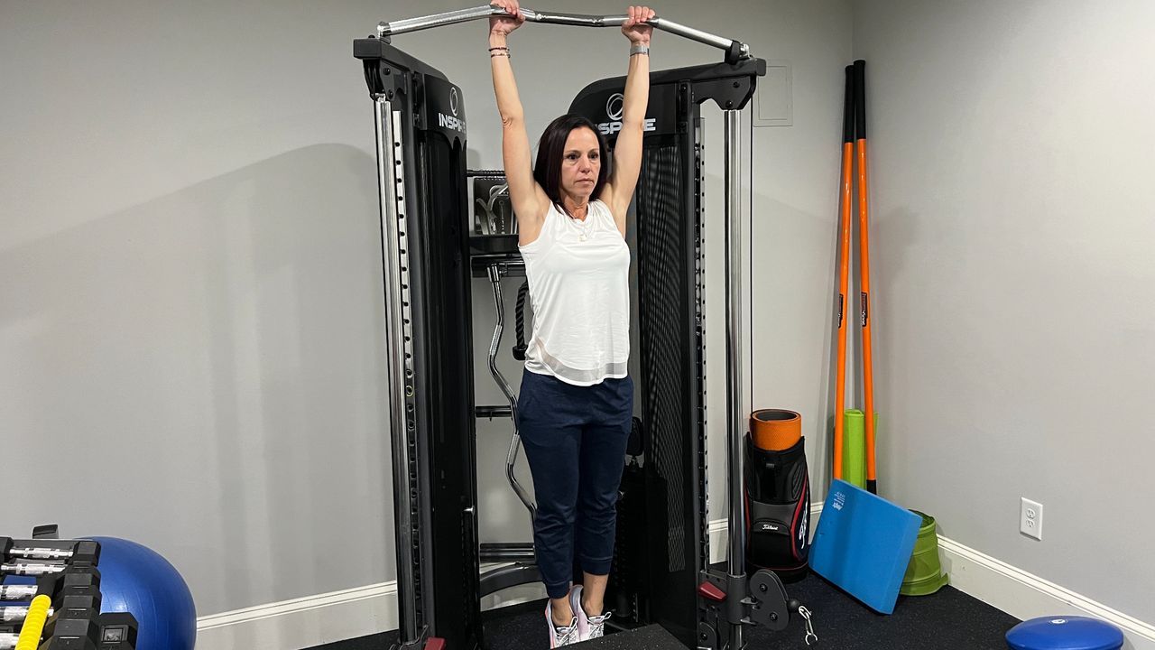 Wendy Batts starting a pull-up