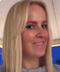 headshot of female with long blond hair