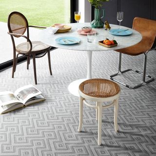 dining table with chairs and grey carpet floor