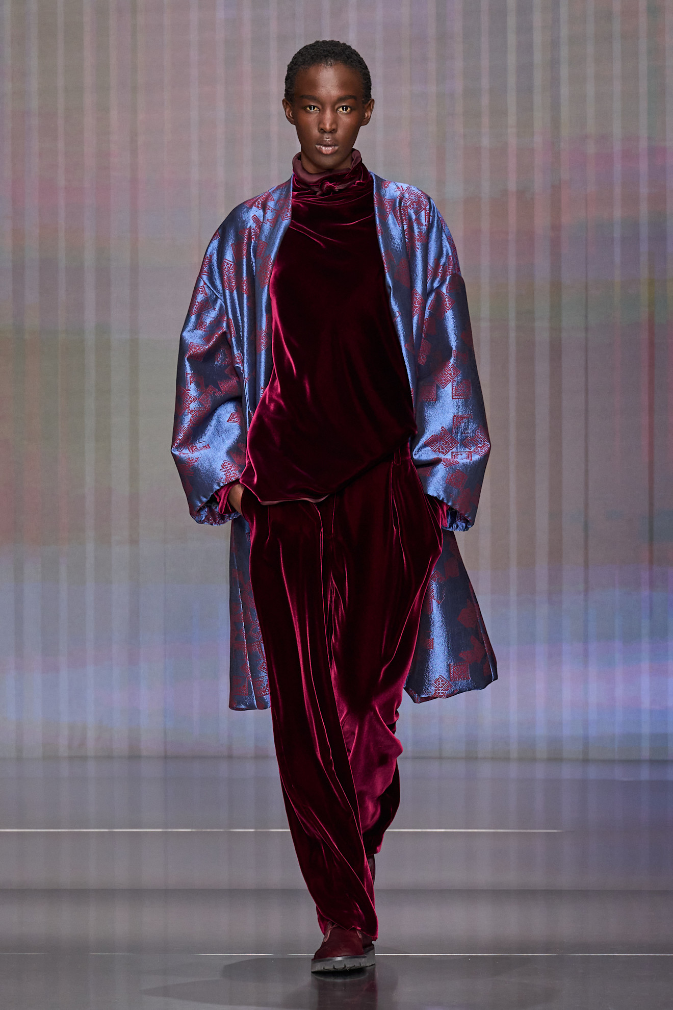 a model walks the runway during giorgio armani fall/winter 2026.