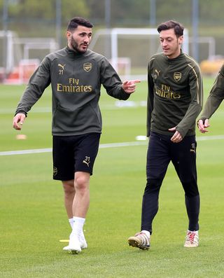 Arsenal’s Sead Kolasinac (left) and Mesut Ozil, who could return to action after a knife attack forced them to miss the opening weekend of the Premier League
