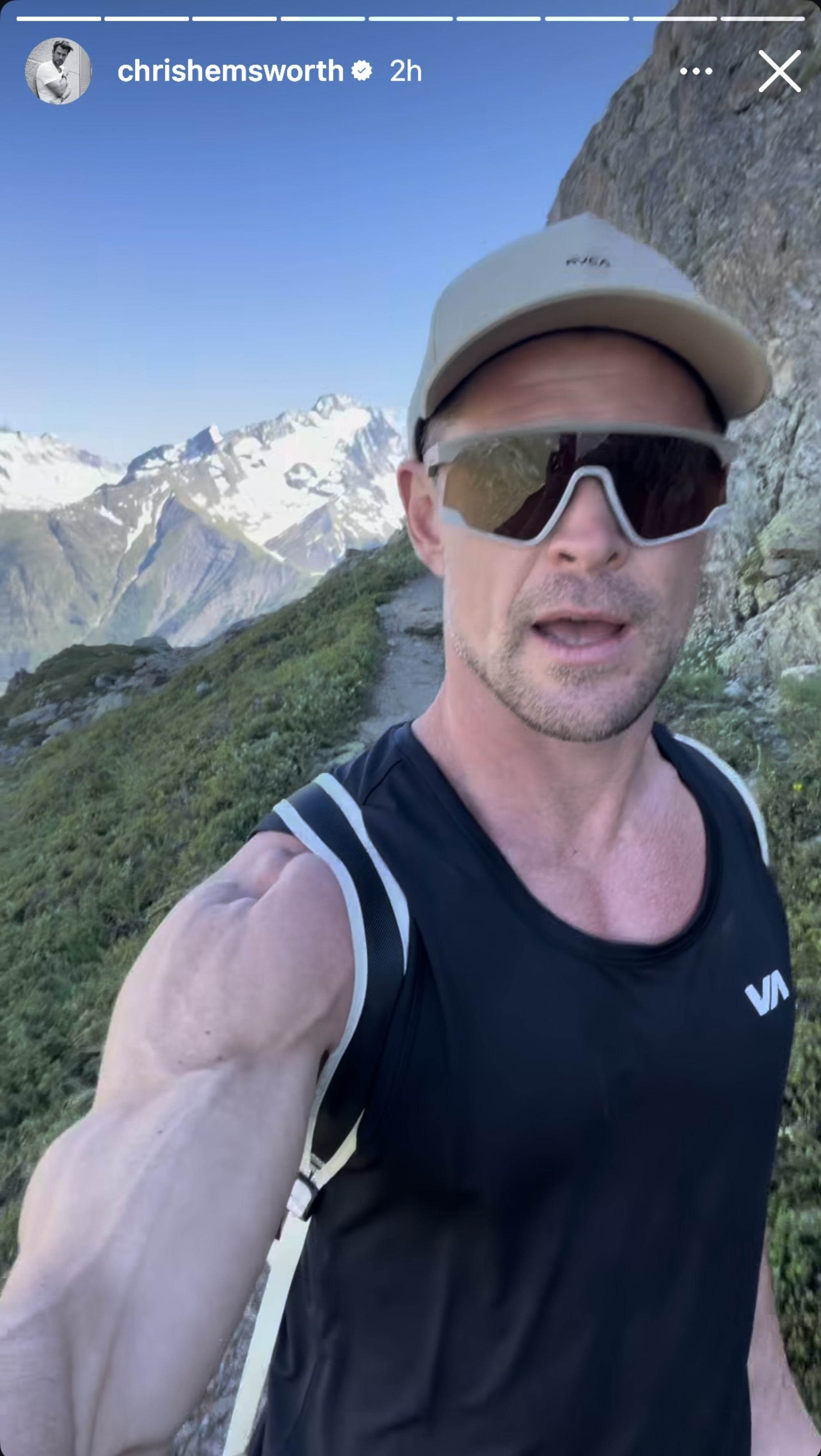 Chris Hemsworth looking straight at the camera in the French Alps.