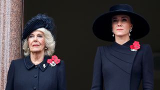 amilla, Queen Consort and Catherine, Princess of Wales wear black dresses and three Remembrance Poppies as they attend the National Service of Remembrance at The Cenotaph on November 13, 2022 in London, England.