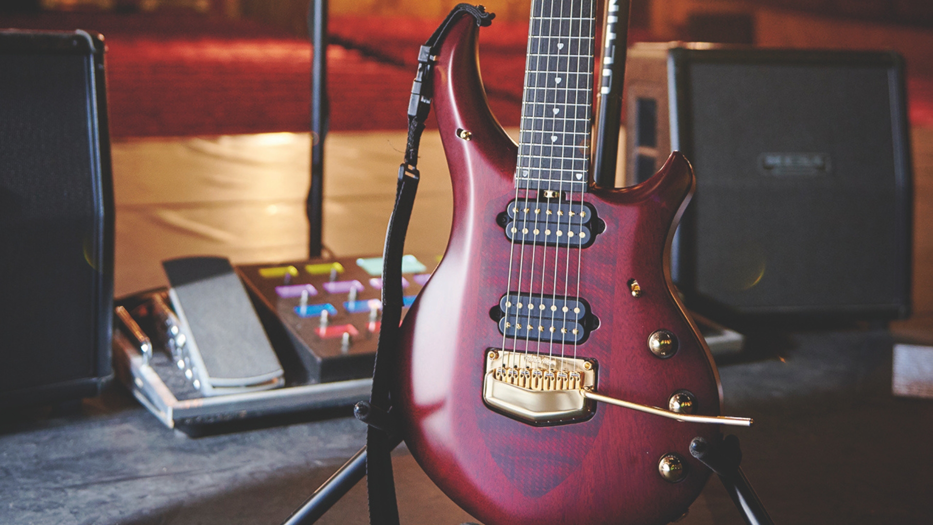 An Ernie Ball Music Man John Petrucci Majesty 7 on a stage