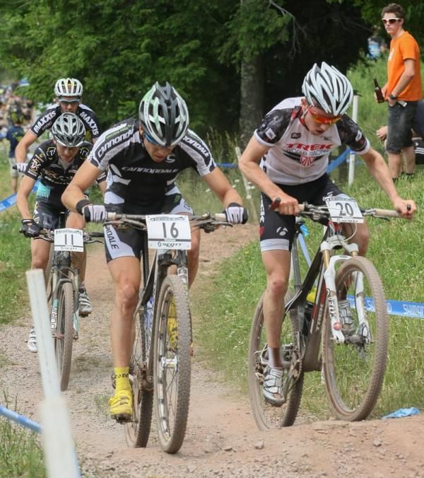 Mathias Fluckiger (Swi) Trek World Racing makes a fast pass of Martin Gujan (Swi) Cannondale to get up to the leaders.