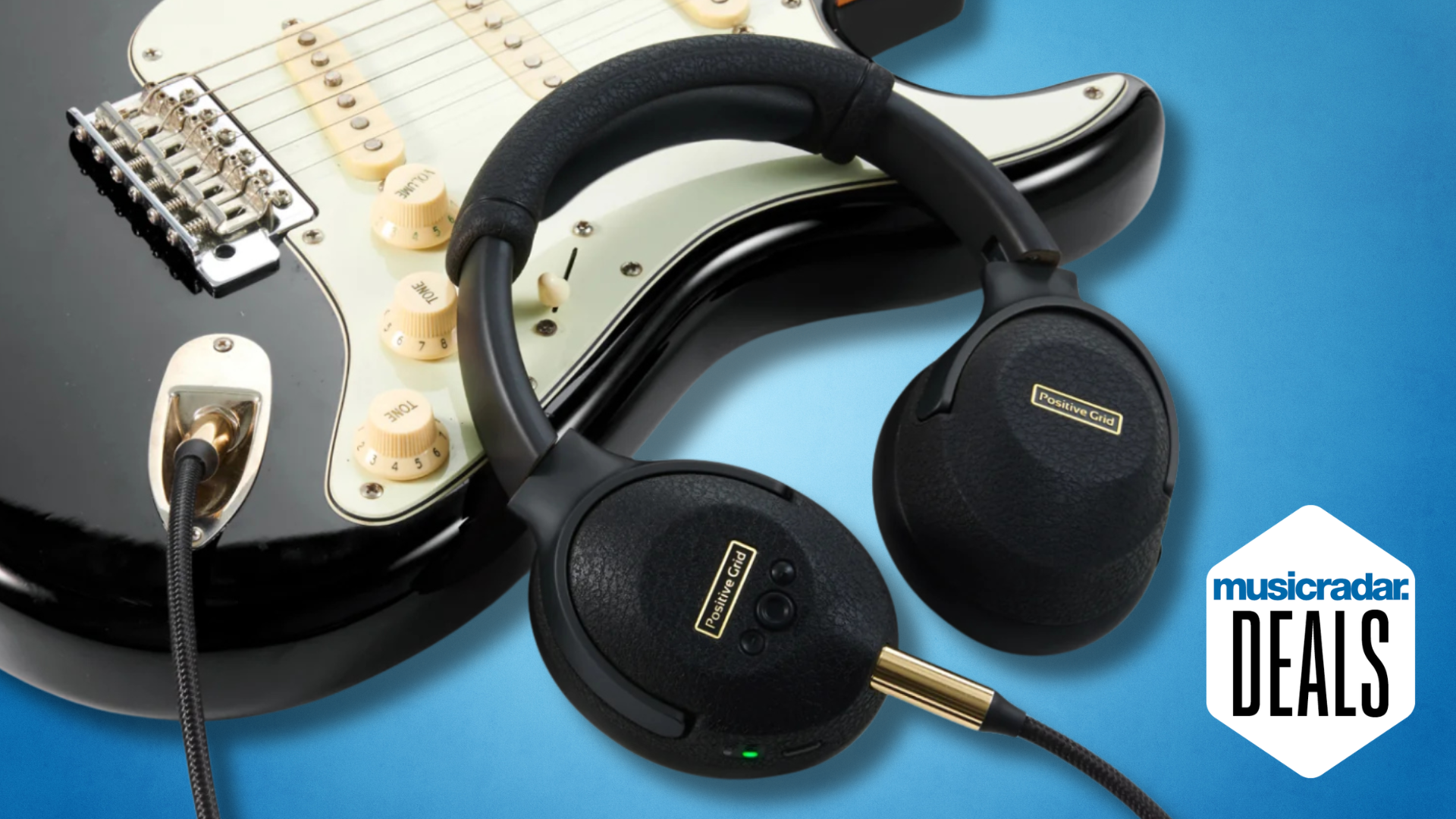 A pair of Positive Grid Spark Neo Core headphones lying on a Stratocaster guitar