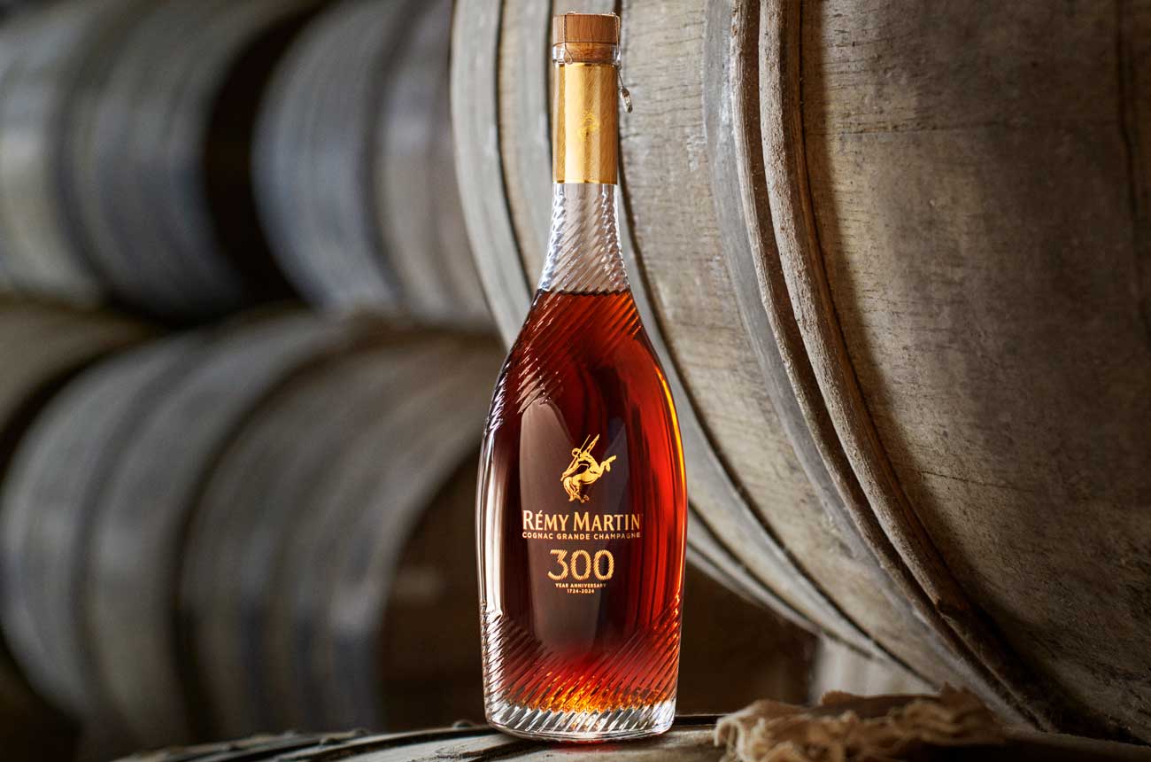 A bottle of R&eacute;my Martin 300th Anniversary Coupe in a barrel cellar