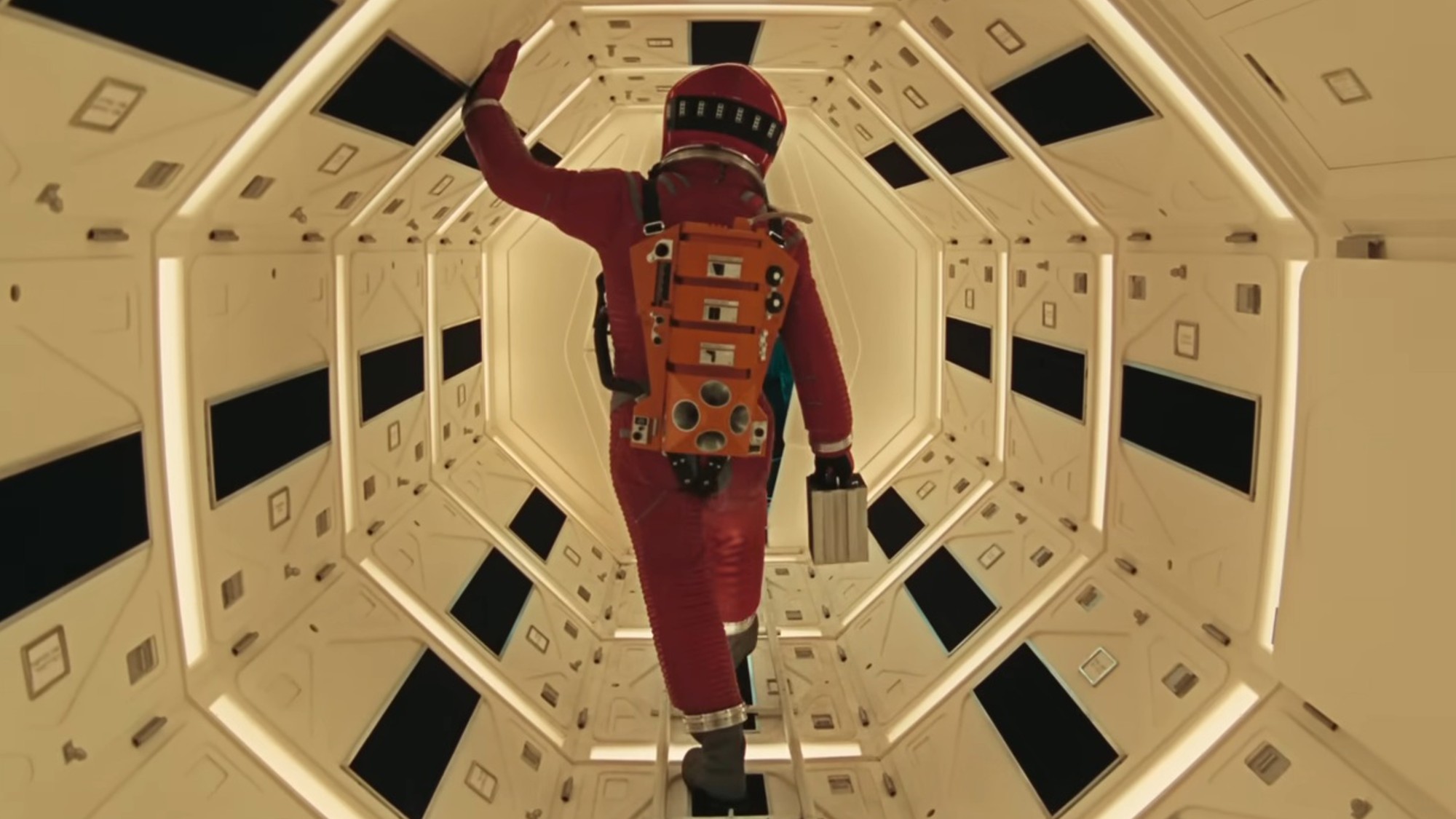 A man a red space suit in 2001: A Space Odyssey