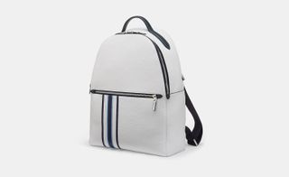 A white leather backpack with blue trim and straps.