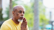 Senior man with a serious expression thinking