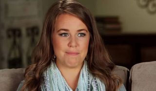 Jana Duggar Half Smiling.