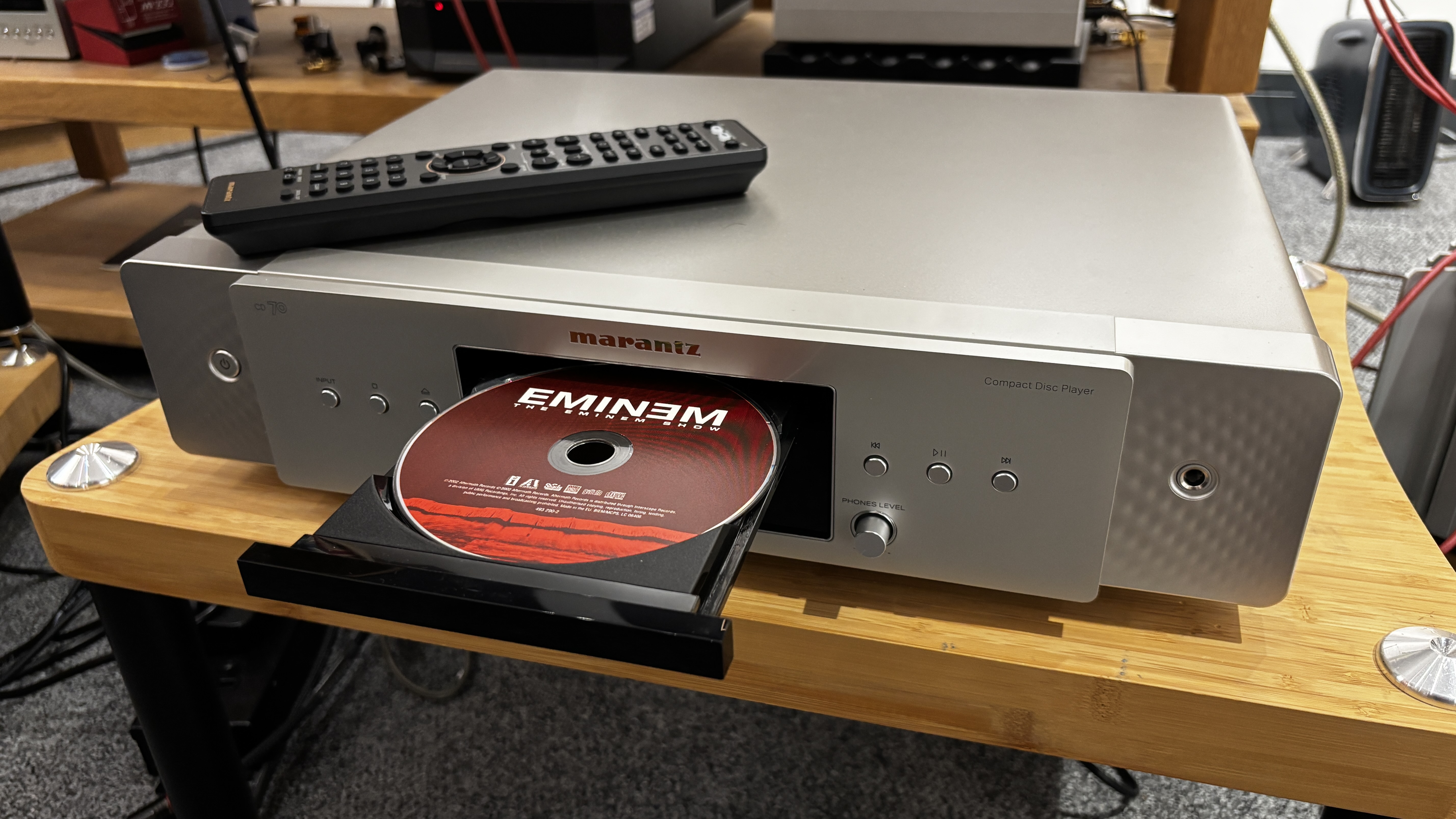 A Marantz CD 70 with its loading drawer open and a CD in place