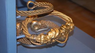 a photo of gold jewelry