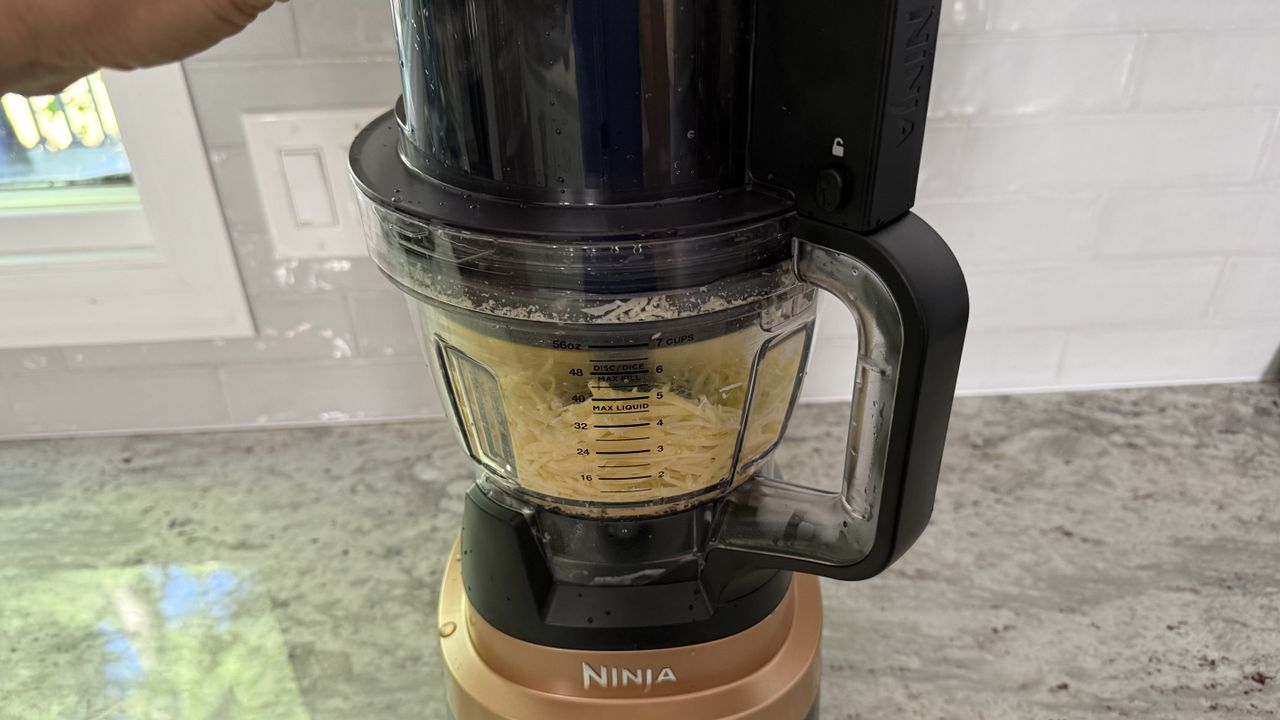 Ninja CrushBOSS shredding Swiss cheese