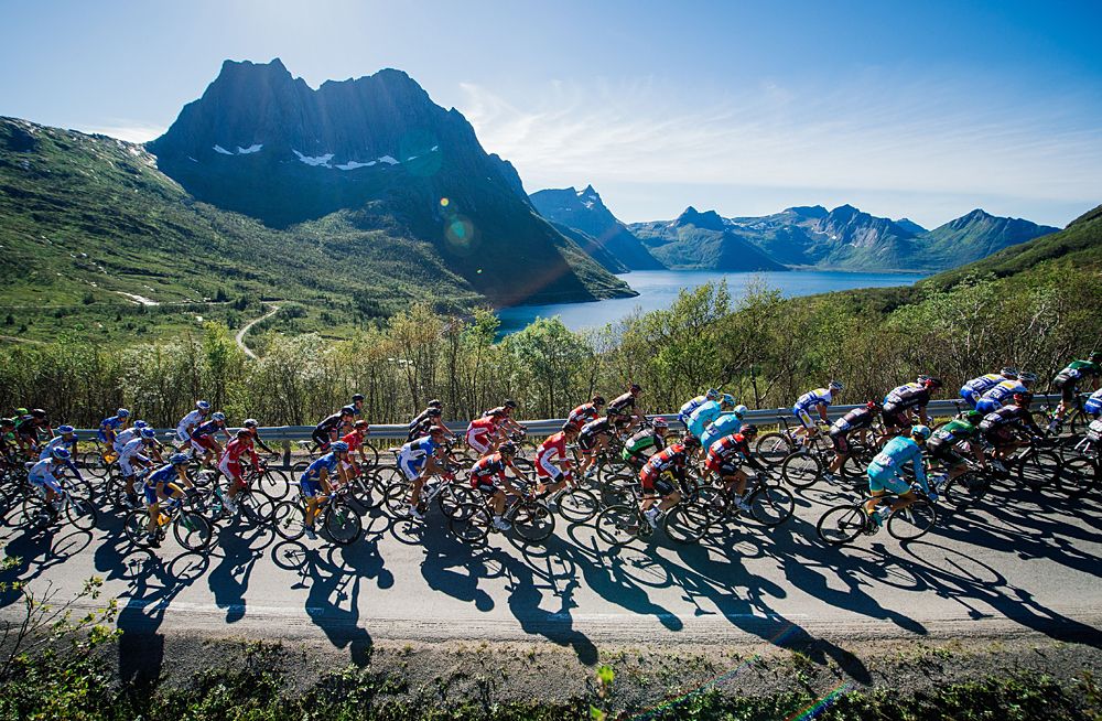 The peloton races through the mountainous terrain at the Arctic Race of Norway