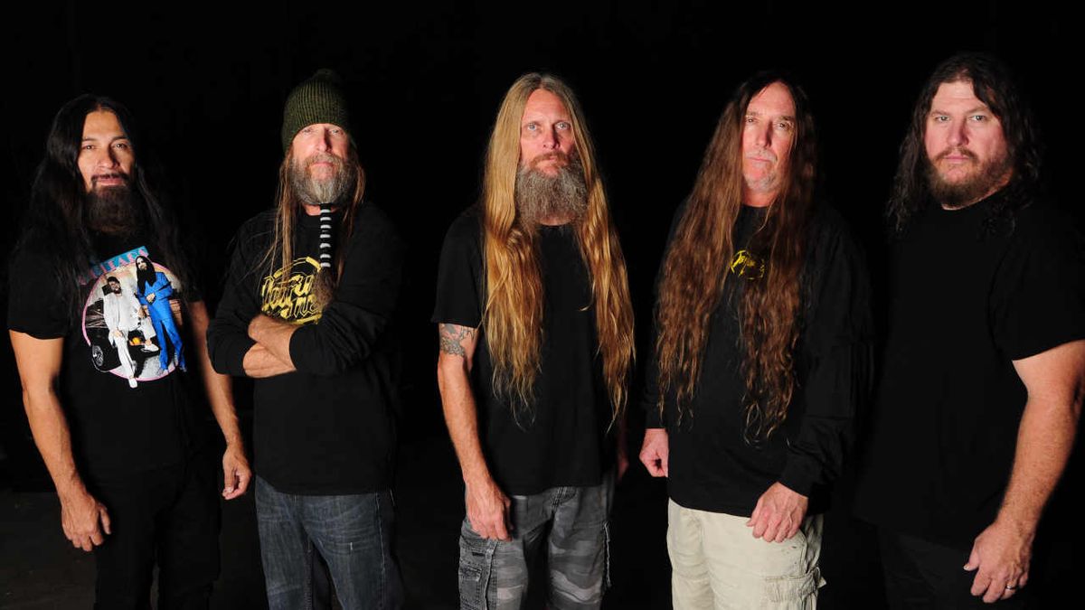 Obituary standing in front of a black background