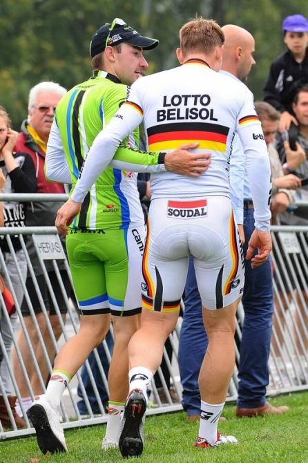Elia Viviani (Cannondale) walking with Andre Greipel (Lotto-Belisol)