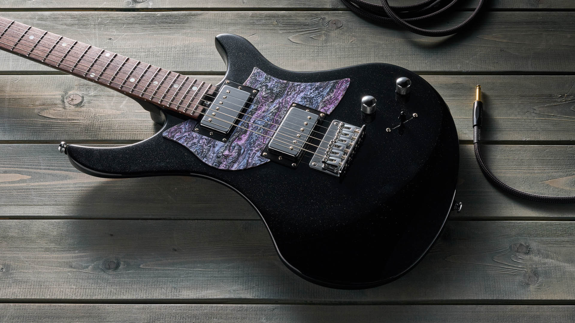 The Venus Revolution is a short-scale electric designed for female players and comes with swappable pickguards