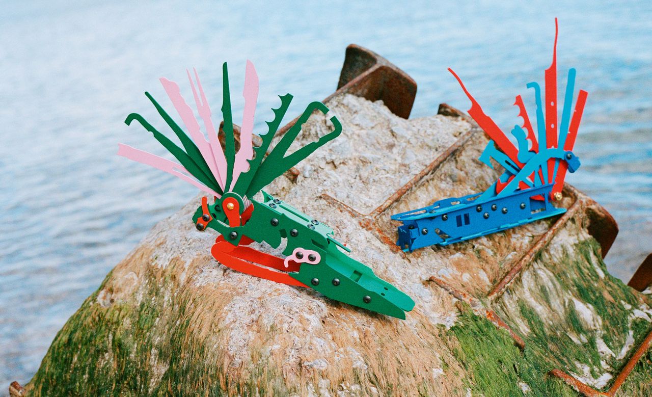 View of Serban Ionescu&#039;s multicoloured ICES (In Case of Emergency Sculptures) pictured outside in front of a body of water