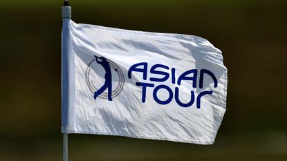 An Asian Tour flag flapping in the wind