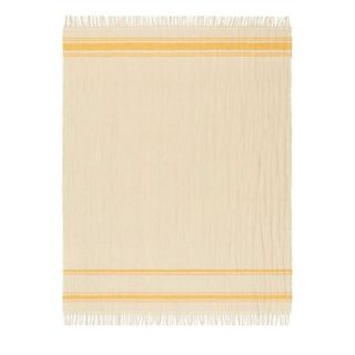 beige and yellow blanket