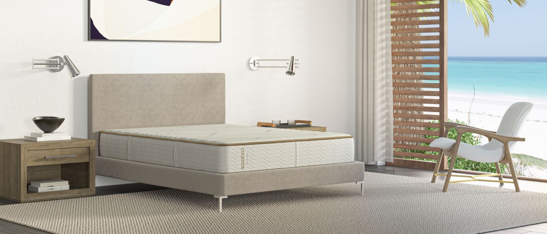 The Saatva Zenhaven Mattress on a bed frame in a luxury looking room by the beach