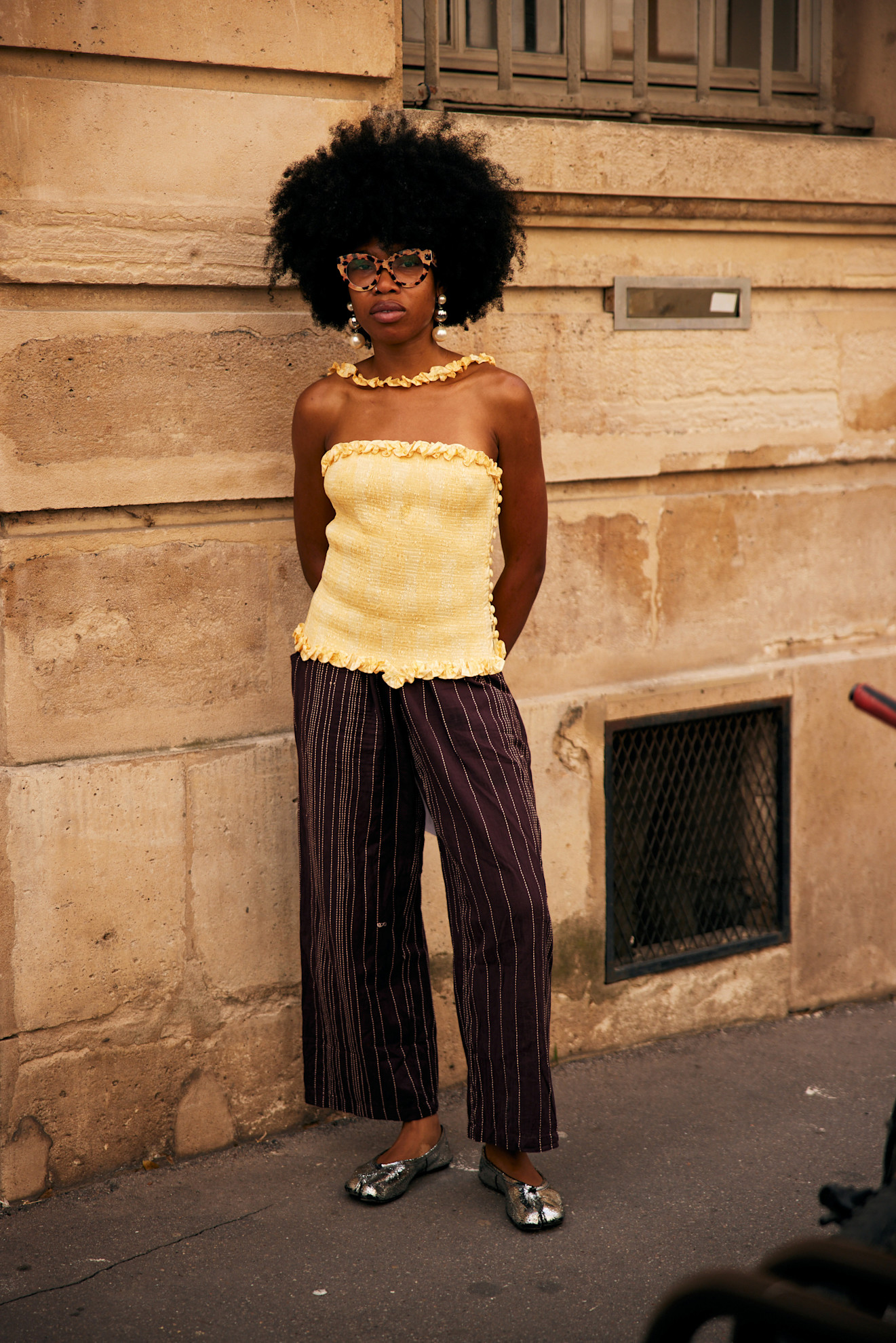 A woman wearing a tube top outfit