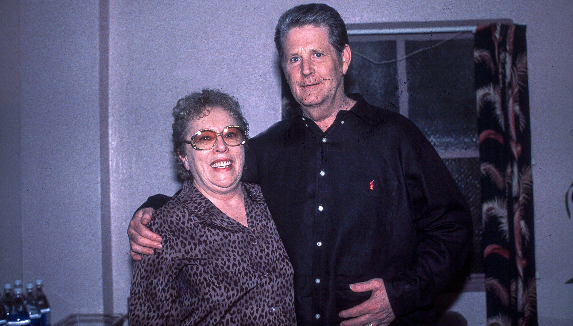 American Rock and Pop musicians Carol Kaye (left) and Brian Wilson pose together at the Wiltern Theater, Los Angeles, California, October 22, 1999.