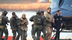 Venezuelan President Nicol&aacute;s Maduro and his wife, Cilia Flores, arrest after seizure by U.S. forces