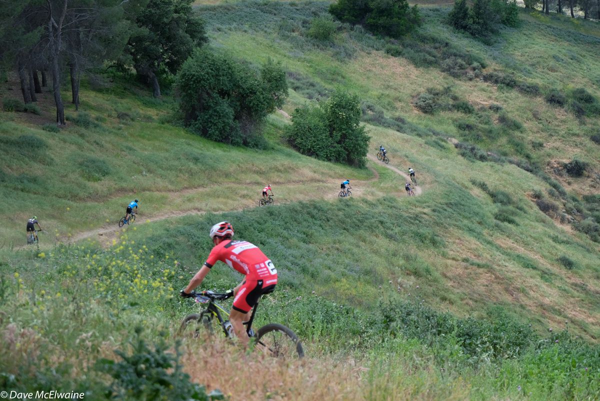 Riders descend into a valley that was followed by a steep singletrack climb