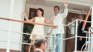 Princess Margaret, Countess of Snowdon and her husband Antony Armstrong-Jones wave from the deck on the Royal Yacht Britannia
