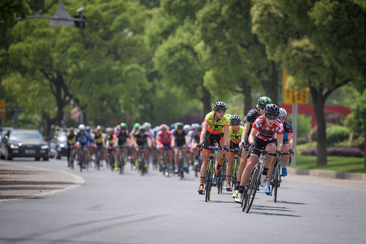 Racing in Xin Cheng Park on stage 3 of the Tour of Chongming Island