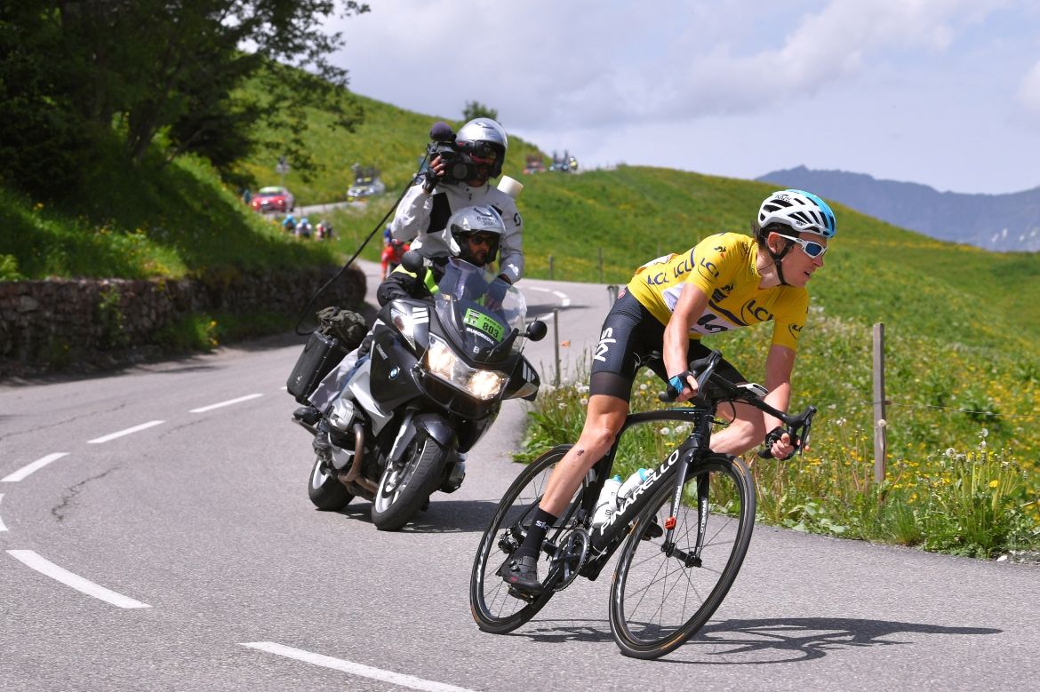Geraint Thomas (Team Sky) chases back after a puncture