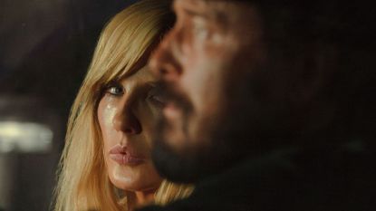 Beth looks at Rip sat next to her