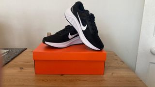 Nike Air Zoom Structure 24 posed on shoebox